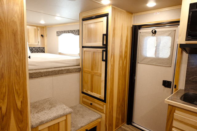 Refrigerator in Living Quarters in C8X11RK Charger Edition Horse Trailer | Lakota Trailers