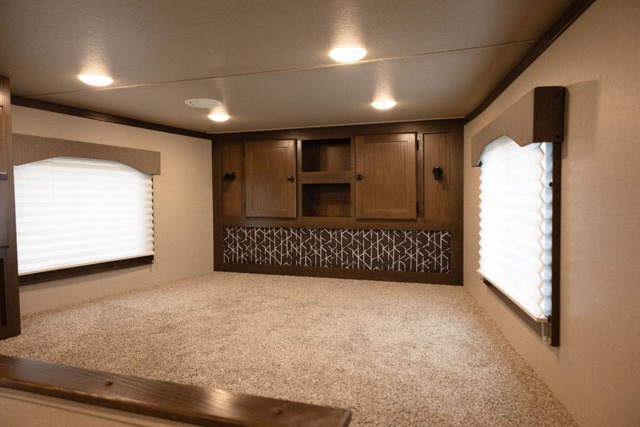 Bed in Gooseneck in LE8X11SR Charger Edition Livestock Trailer | Lakota Trailers