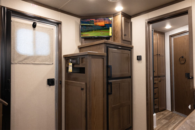 TV in Living Quarters in LE8X11SR Charger Edition Horse Trailer | Lakota Trailers