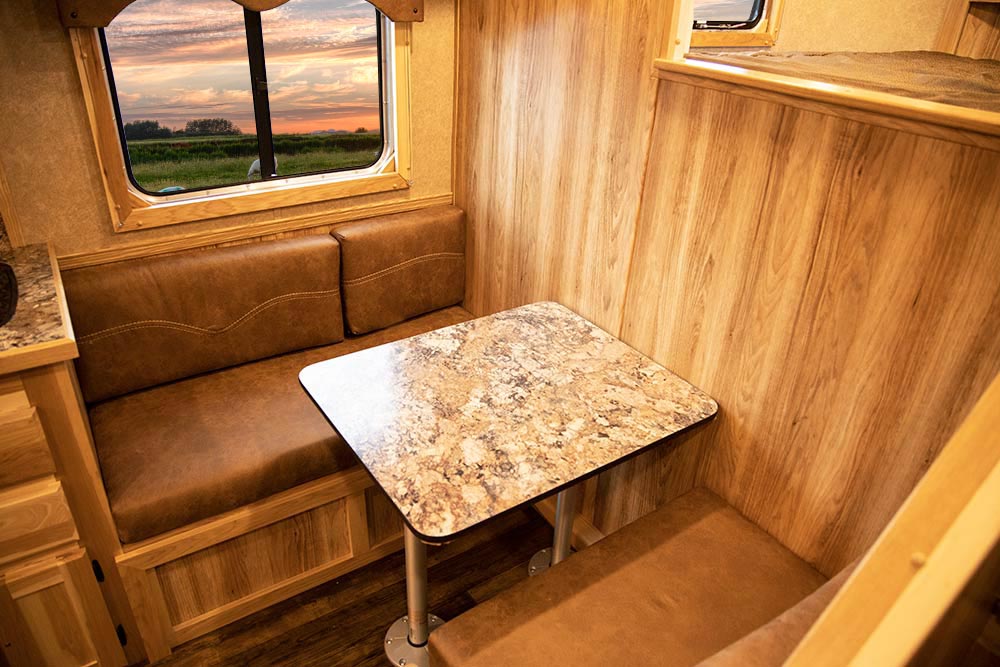 Dinette in LE8X11DR Charger Edition Livestock Trailer | Lakota Trailers
