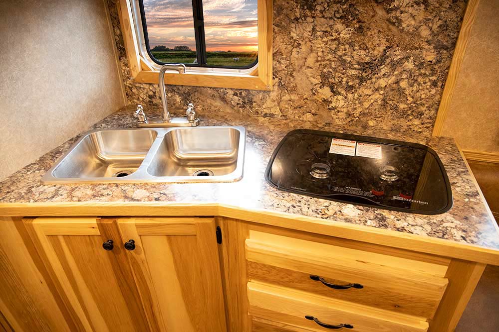Kitchen Area in LE8X11DR Charger Edition Livestock Trailer | Lakota Trailers