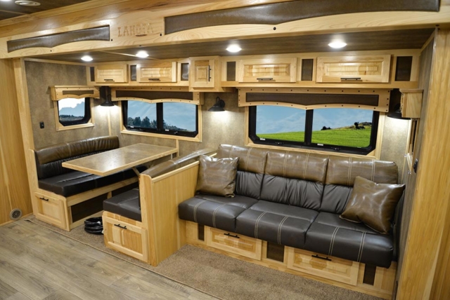 Dinette and Sofa in Slide-Out in BTH8X192S Bighorn Edition Toy Hauler | Lakota Trailers