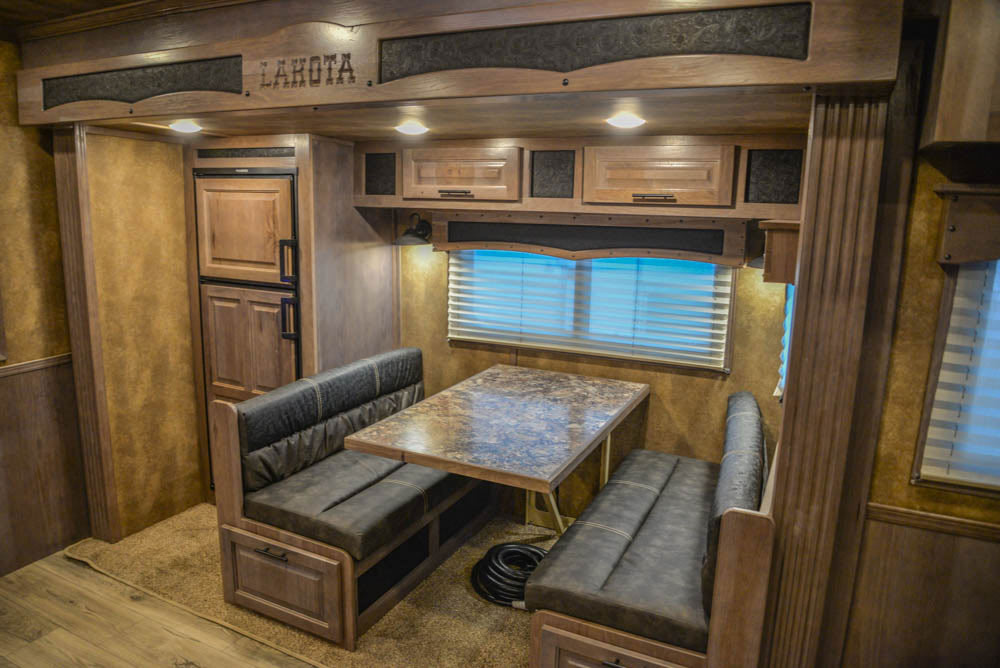 Dinette in Slide-out in BH8X19SROK Bighorn Edition Horse Trailer | Lakota Trailers