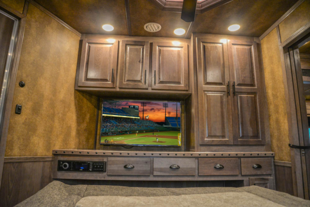 TV in Bedroom in Living Quarters in BH8X23T2S Bighorn Edition Horse Trailer | Lakota Trailers