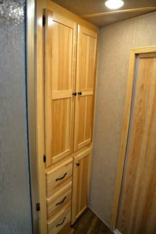Cabinets in Bathroom Area in C8X15SR Charger Edition Horse Trailer | Lakota Trailers