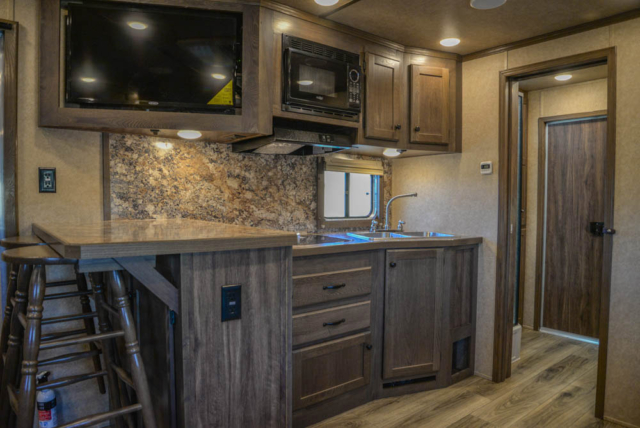 Kitchen Area in CTH8X15SRB Charger Edition Toy Hauler Trailer | Lakota Trailers
