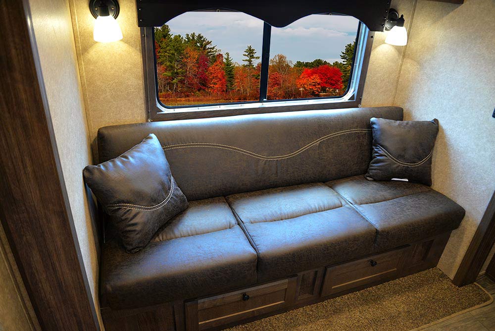Sofa in Slide-Out in CX9ST Charger Edition Horse Trailer | Lakota Trailers