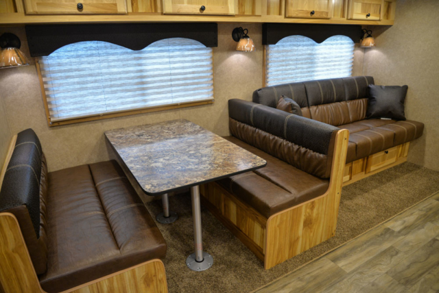 Dinette and Sofa in a C8X17EH Charger Edition Horse Trailer| Lakota Trailers