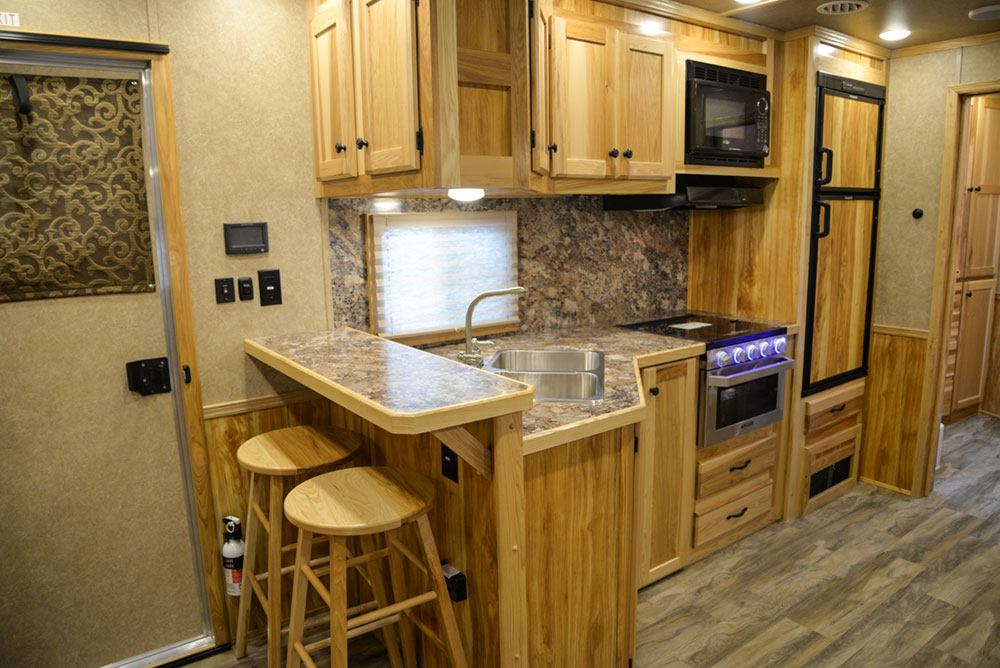 Kitchen and Bar in a C8X17EH Charger Edition Horse Trailer| Lakota Trailers