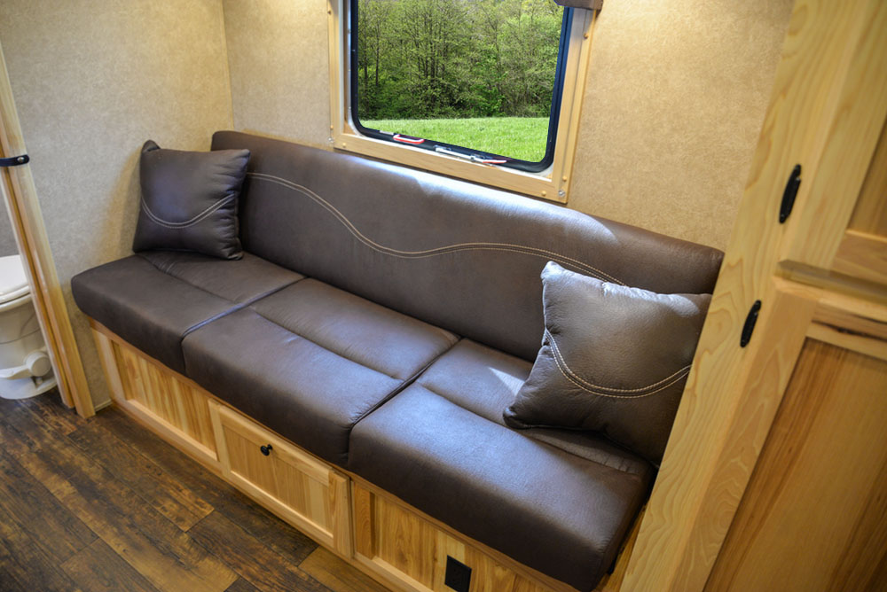 Sofa in a Charger Bumper Pull C8XHSLBP12SE | Lakota Trailers