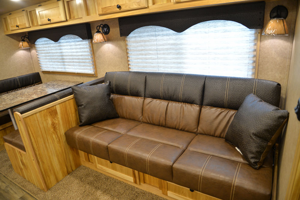 Sofa in a C8X17EH Charger Edition Horse Trailer| Lakota Trailers