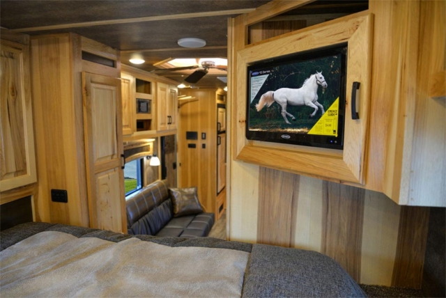 TV in Gooseneck in a BH8X15TDSRK Bighorn Edition Horse Trailer | Lakota Trailers
