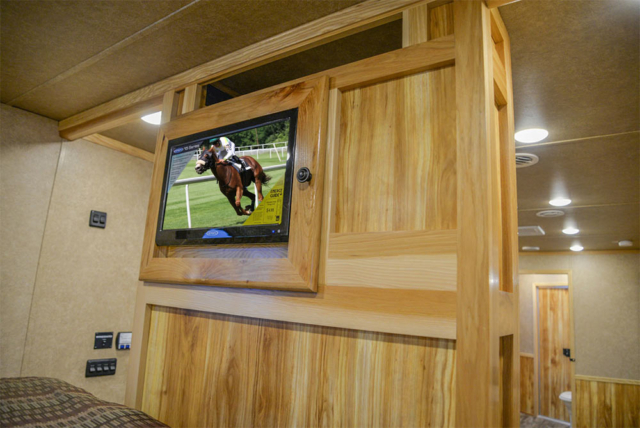 TV in Gooseneck in C8X18CE Charger Edition Horse Trailer | Lakota Trailers