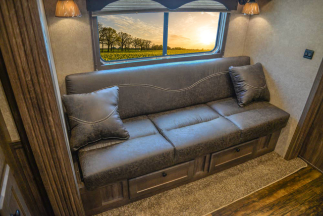 Sofa in Slide-Out in CX11 Charger Edition Horse Trailer | Lakota Trailers