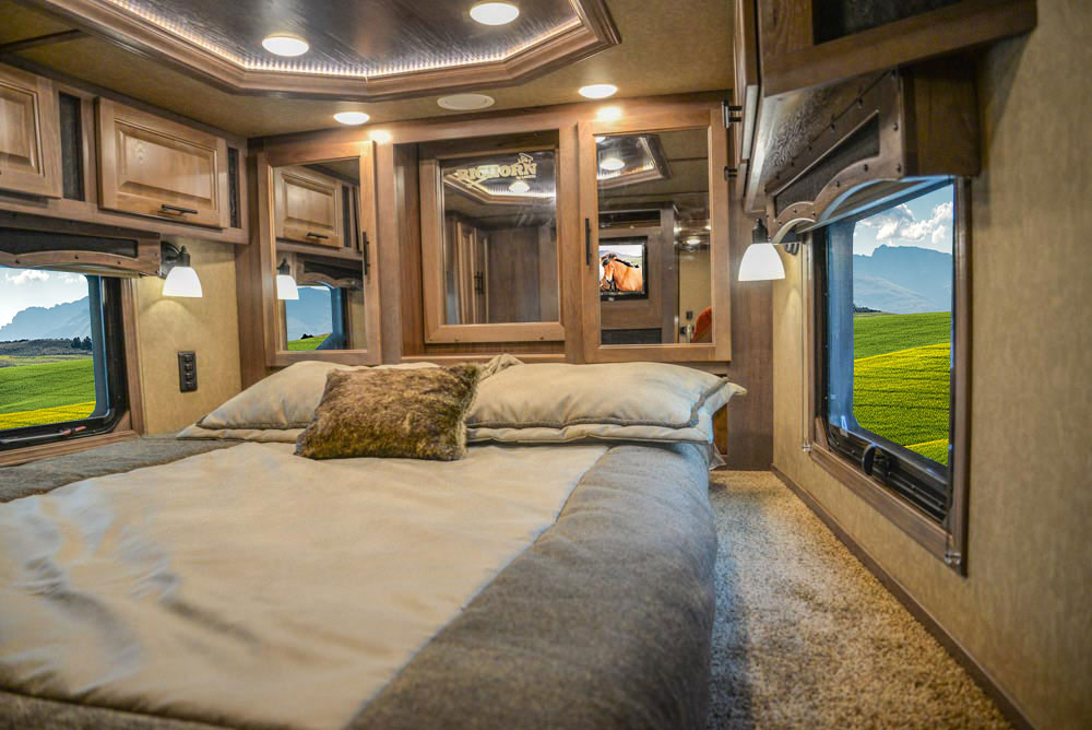 Bed in Gooseneck of a BH8X19TBB Bighorn Edition Horse Trailer | Lakota Trailers