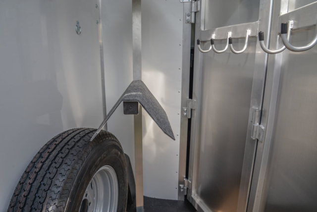 Tack Area in a C8XHSLBP12SE Charger Bumper Pull Horse Trailer | Lakota Trailers