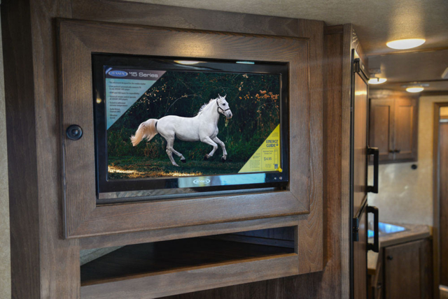 TV in Gooseneck in LE8X11RK Charger Edition Livestock Trailer | Lakota Trailers